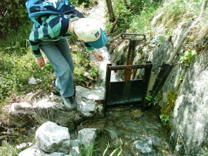 le réglage du débit d'alimentation du moulin